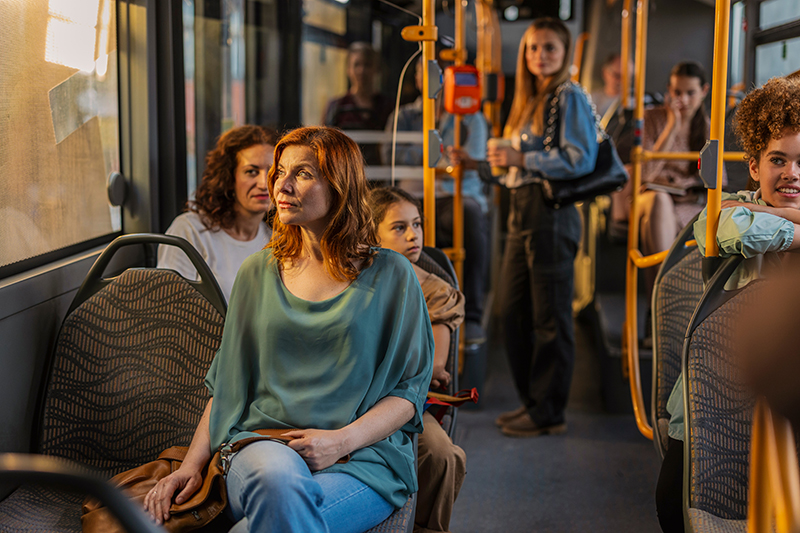 woman riding a bus